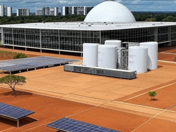Vista da Câmara Legislativa do DF com elementos de energia de hidrogênio, destacando críticas a lei ineficaz.